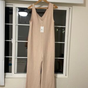Brand new! Never worn size small bar the label maternity jumpsuit